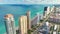 Aerial view of Sunny Isles Beach city with congested street traffic and luxurious highrise hotels and condos on Atlantic