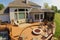 Aerial View of Sunny Suburban Deck with Fire Pit and Gazebo