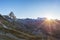 Aerial view at sunrise of Breuil Cervinia village and Cervino or Matterhorn mountain peak, famous ski resort in Aosta Valley, Ita