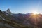 Aerial view at sunrise of Breuil Cervinia village and Cervino or Matterhorn mountain peak, famous ski resort in Aosta Valley, Ita