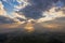 Aerial view of Sunrise among forests, meadows and fields