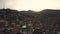 Aerial View of Sunset Above Hillside Slum Favela Buildings in Medellin Colombia