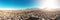 Aerial view of a sunset in Arequipa city with Chachani volcano as background, Peru