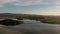 Aerial view of sunset on lake with reflection of clouds on the lake - Gruza lake, Kragujevac, Serbia