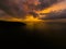 Aerial view of sunset over the sea , Phuket, Thialand. Sunset of sun setting over ocean. Tranquil idyllic scene of a golden sunset