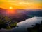 Aerial view of sunset over Ullswater lake in Lake District, a region and national park in Cumbria in northwest England