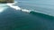 Aerial view with surfers and waves in ocean. Surfing and waves