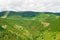 Aerial view of suspension Sky Bridge 721 and observation tower in mountains