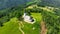 Aerial View of Sveti Jakob Hill with a Church on Top. Slovenia, Europe