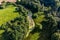 Aerial view of a swampy oxbow lake in the midst of dense greenery