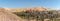 Aerial view of Taghit from rocky mountain Djebel Baroun in foreground.