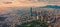 Aerial view of Taipei cityscape featuring modern skyscrapers and other urban buildings.