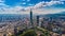 Aerial view of Taipei cityscape featuring modern skyscrapers and other urban buildings.