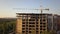 Aerial view of tall residential apartment buildings under construction.