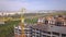 Aerial view of tall residential apartment buildings under construction.