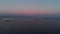 Aerial view of a tanker moving or parked at sea at night