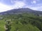 Aerial view of tea plantation in Kemuning, Indonesia with Lawu mountain background
