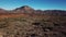 Aerial view of the Teide National Park, flight over the mountains and hardened lava. Tenerife, Canary Islands