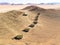 Aerial view: Tents with view of Tiras mounains,  Namibia Africa