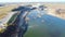 Aerial view Texas side of Denison Dam with hydroelectric turbine powerhouse impounds Lake Texoma