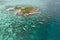 Aerial view of Thai traditional longtail boats and unidentified tourists snorkeling activity on tropical island near Lipe Island,