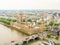 Aerial view of the Thames River, Houses of Parliament, Big Ben clocktower and Westminster Bridge