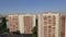 An aerial view of three similar looking multi storey buildings