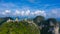 Aerial view Tiger Cave Temple, Buddha on the top Mountain with blue sky of Wat Tham Seua, Krabi,Thailand