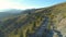 Aerial View Of A timber truck Driving A Mountain way