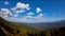 Aerial view time lapse of mountain clouds