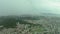 Aerial view time-lapse of Taipei with passing clouds and fog