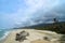 Aerial view to amazing tropical beach under tragic stormy sky