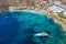 Aerial view to the famous Psarou beach, Mykonos, Greece