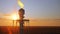 Aerial view to gas flare stack of petroleum refineries sunset background, flare pit tower