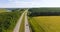 Aerial view to highway road with cars, countryside rural landsca