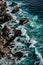 Aerial view to sea landscape, water with waves and rocks. Dramatic colors photo