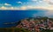 Aerial view to Vila do Corvo and Flores island at sunset, Corvo island, Azores, Portugal