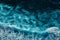 Aerial view to waves in ocean Splashing Waves. Blue clean wavy sea water. Seething waves