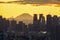 Aerial view of Tokyo Downtown and Fuji mountain. Financial district and business centers in smart urban city in Asia. Skyscraper