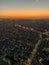 Aerial view of Tokyo Skyline with sunset orange sky on the horizon
