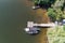 Aerial view top down High angle view drone shot of the longtail fishing boats in canal