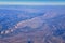 Aerial view of topographical Rocky Mountain landscapes on flight over Colorado and Utah during autumn. Grand sweeping views of riv