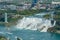 Aerial view of a tourist ship driving pass the beautiful Niagara Falls