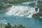 Aerial view of a tourist ship driving pass the beautiful Niagara Falls