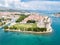 Aerial view of touristic old Trogir, historic town on a small island and harbour on the Adriatic coast in Split-Dalmatia, Croatia.