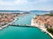 Aerial view of touristic old Trogir, historic town on a small island and harbour on the Adriatic coast in Split-Dalmatia, Croatia.