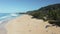 Aerial view of tourists on the Banzai Pipeline beach on North Shore of Oahu