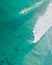 Aerial view of tourists on kayaks floating on the sea