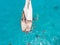 Aerial view of Tourists Snorkeling Around a boats on a Boat Tour at Zanzibar