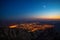 Aerial view toward city from mountain hill